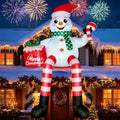 CORALMEE 16FT Giant Christmas Inflatables Sitting Snowman Outdoor Blow Up / Christmas Snowman Holding Candy